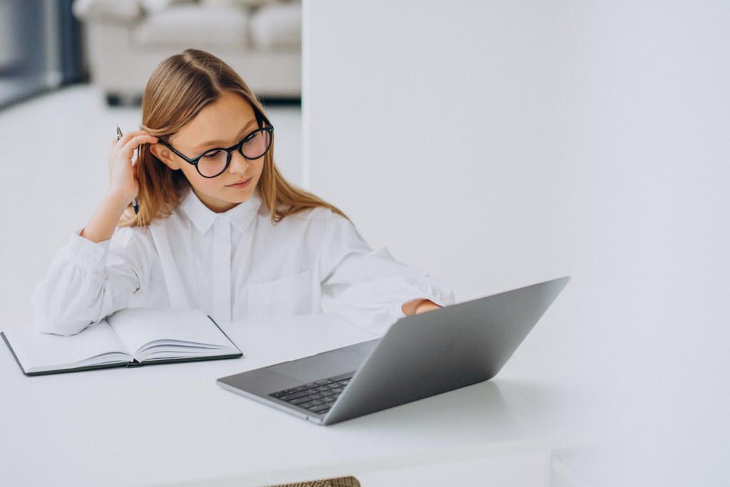 cute-girl-studying-computer-home.jpg